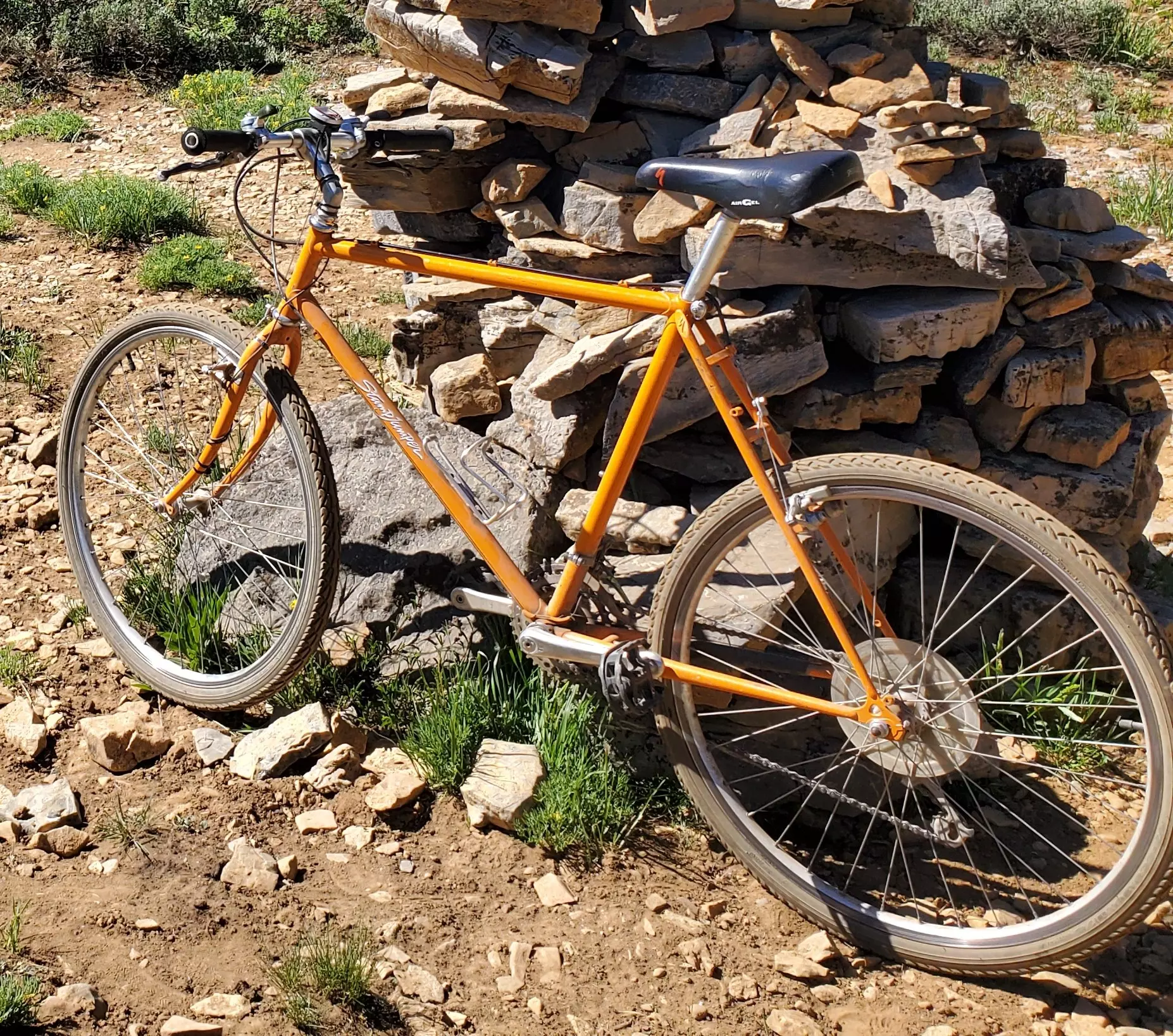 Orange bike on a trail